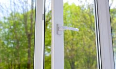 open plastic vinyl window on a green tree background